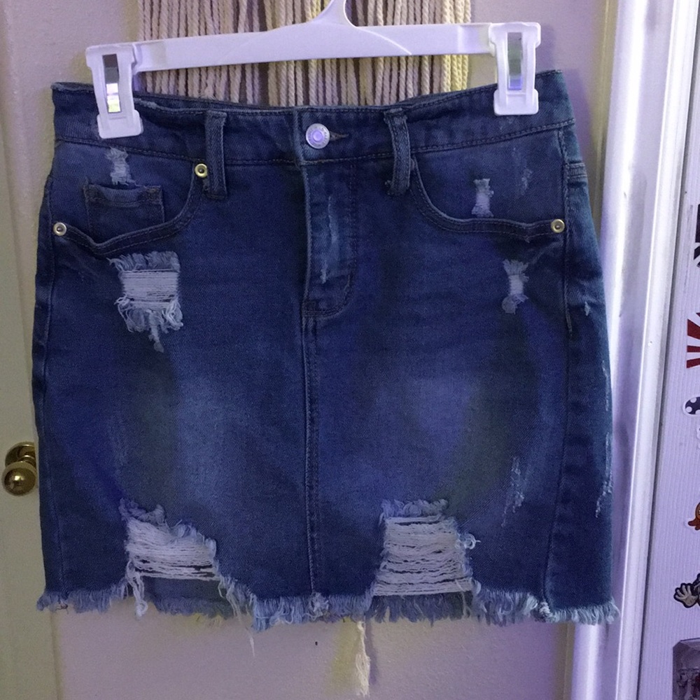 Distressed jean mini-skirt
